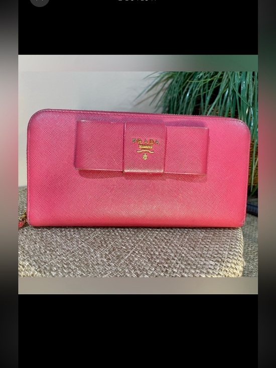 Prada Handbags - Prada Bow Pink Zip Around Long Wallet Wallet with Bow Accent and Gold
Hardware